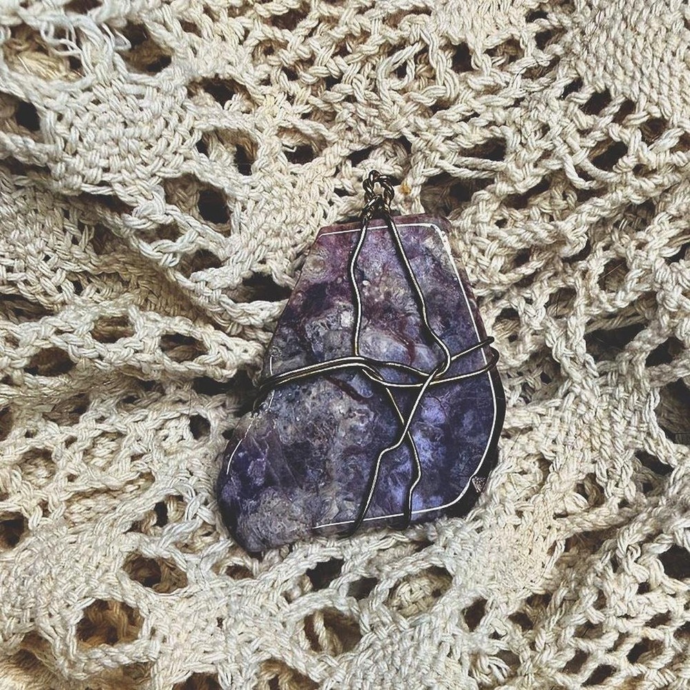 Wire wrapped purple stone pendant